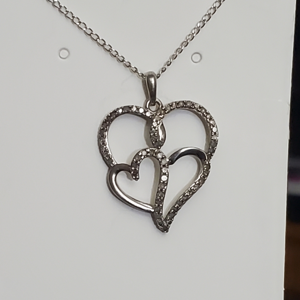 Genuine diiamond necklace! The chain is solid sterling silver stamped sterling a